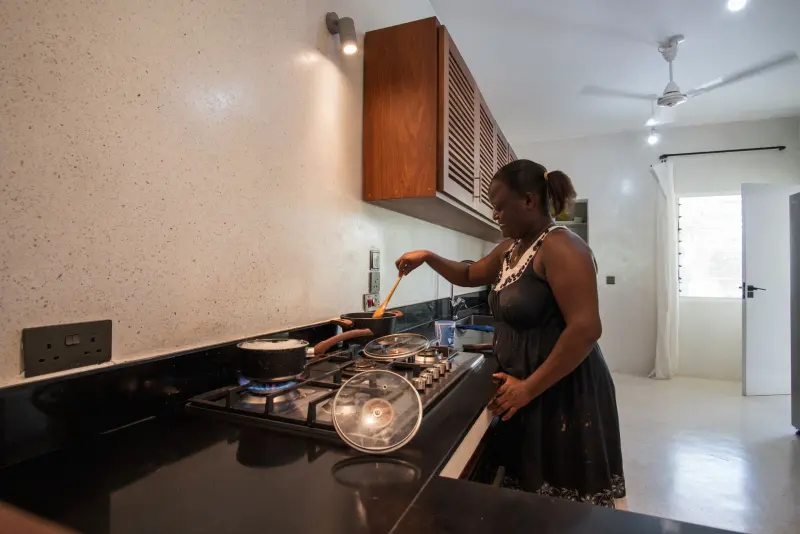 The private chef cooking in the villa kitchen