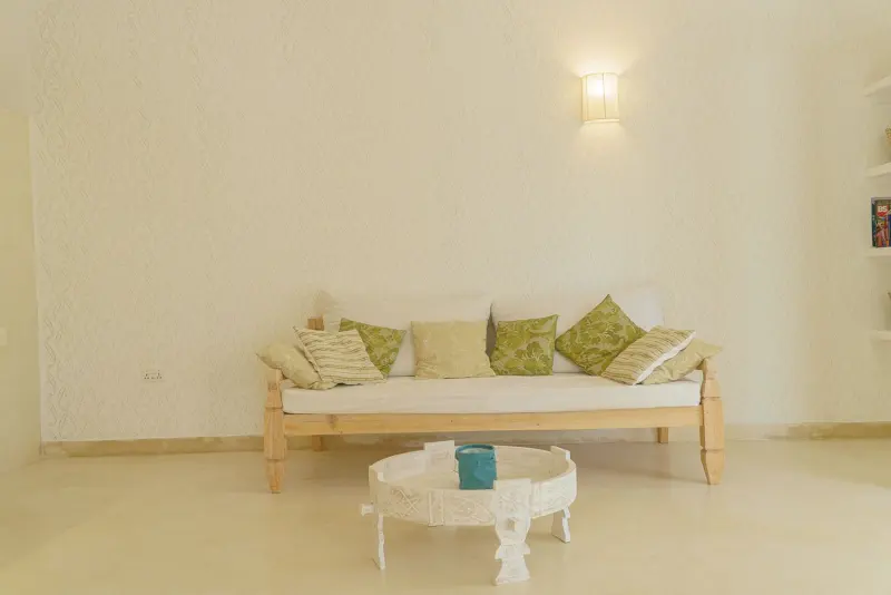 A white daybed in the living room