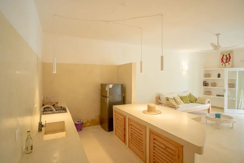 The kitchen with wooden cabinets