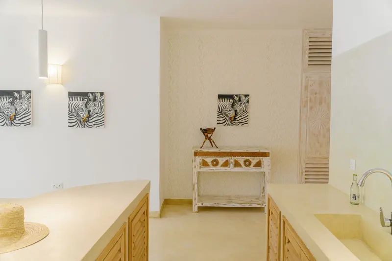 A bedroom corner with a console table