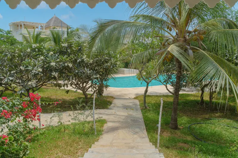The garden path leading to the pool